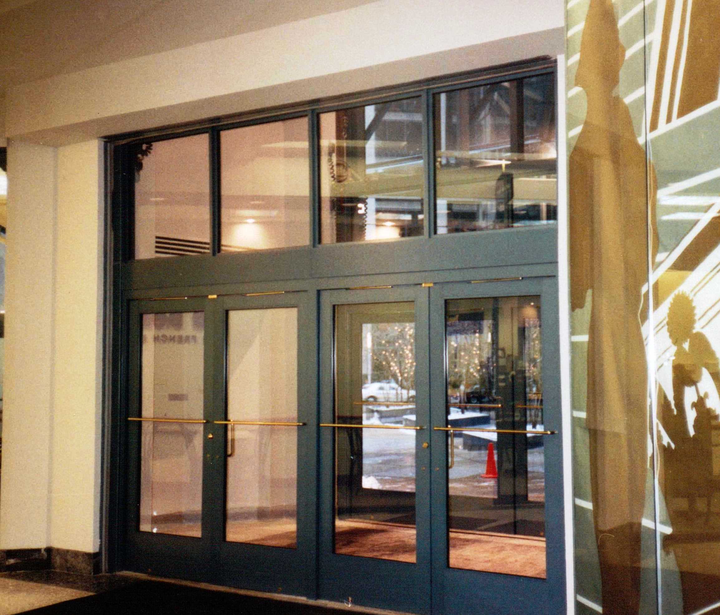 Glazed Vertical Lift Door with Mandoors on the Liberty Place in Philadelphia, PA
