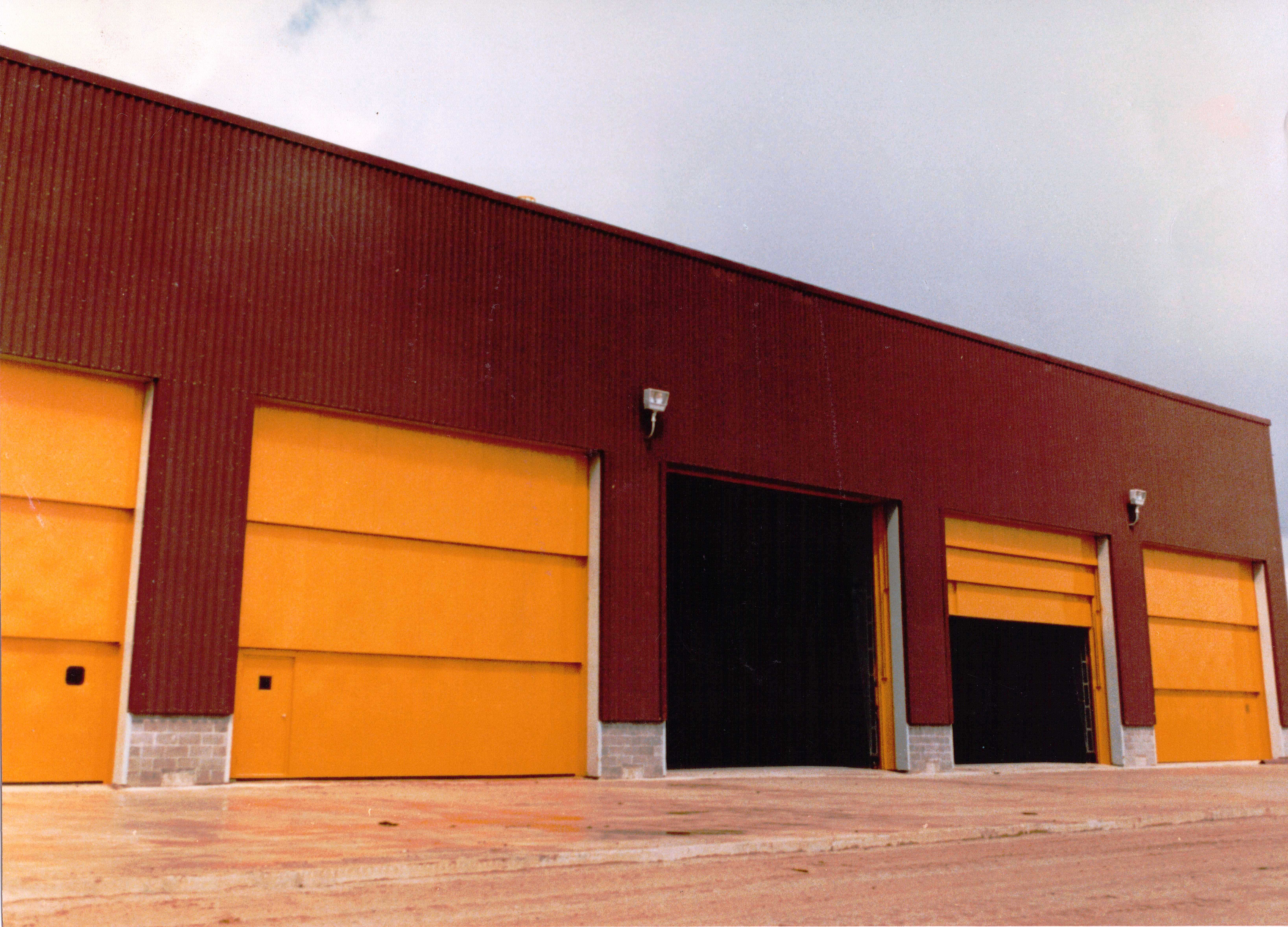 Vertical Lift Doors with Mandoor on the Truck Shop on a Taconite in Hibbing, MN